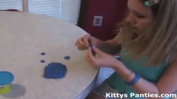 Cute teen Kitty playing with playdough